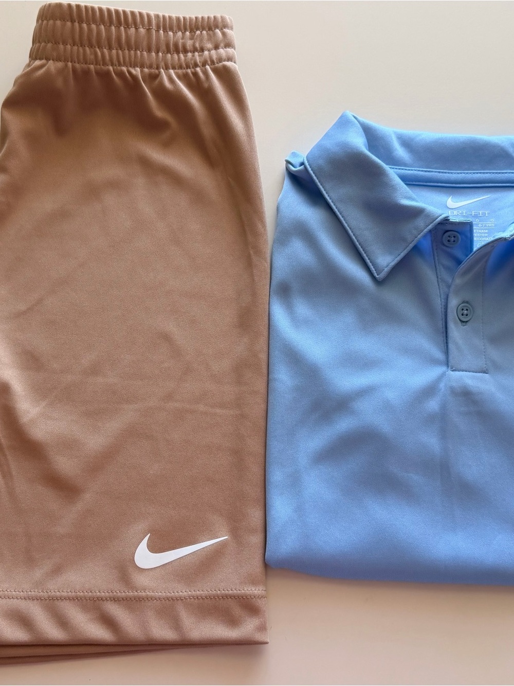 Nike Light Blue Kids Polo with Tan Nike Shorts